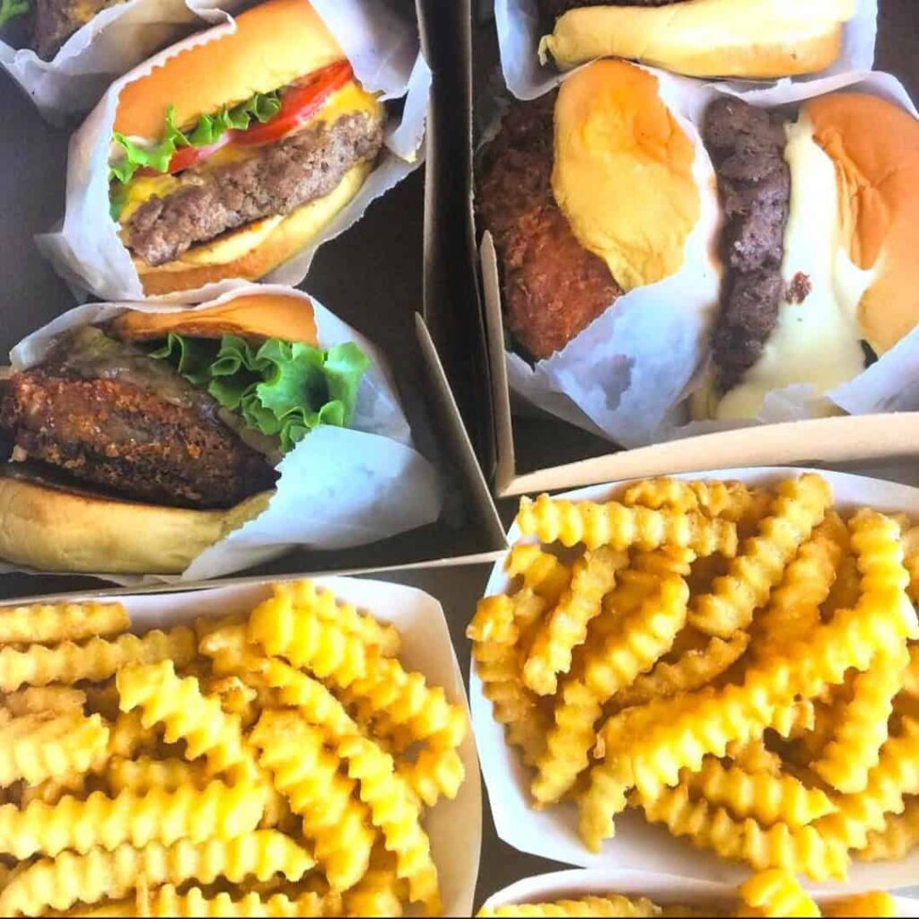 Hamburgers and crinkle cut french fries